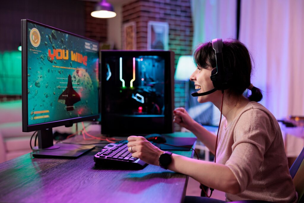 Gamer girl winning game level
